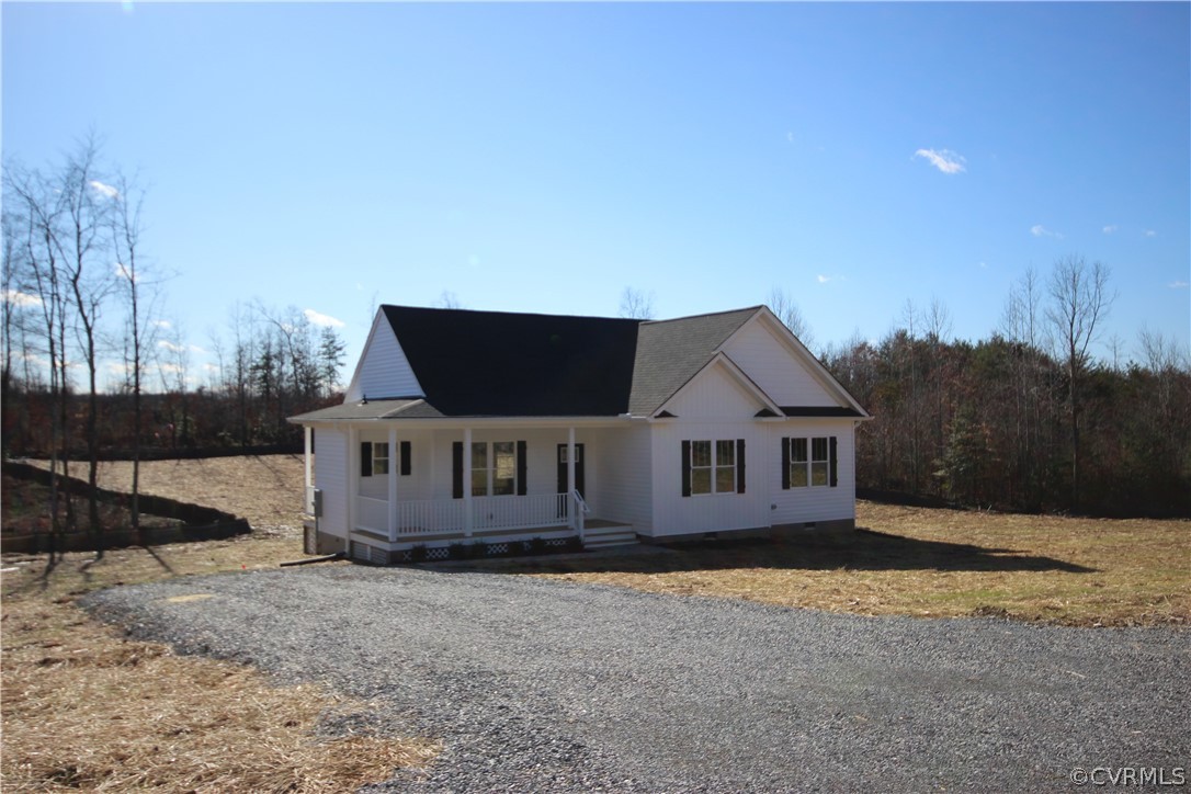 209 New S Ridge Road Bumpass, VA 23024 - Photo 2 of 26 a front view of a house with a yard