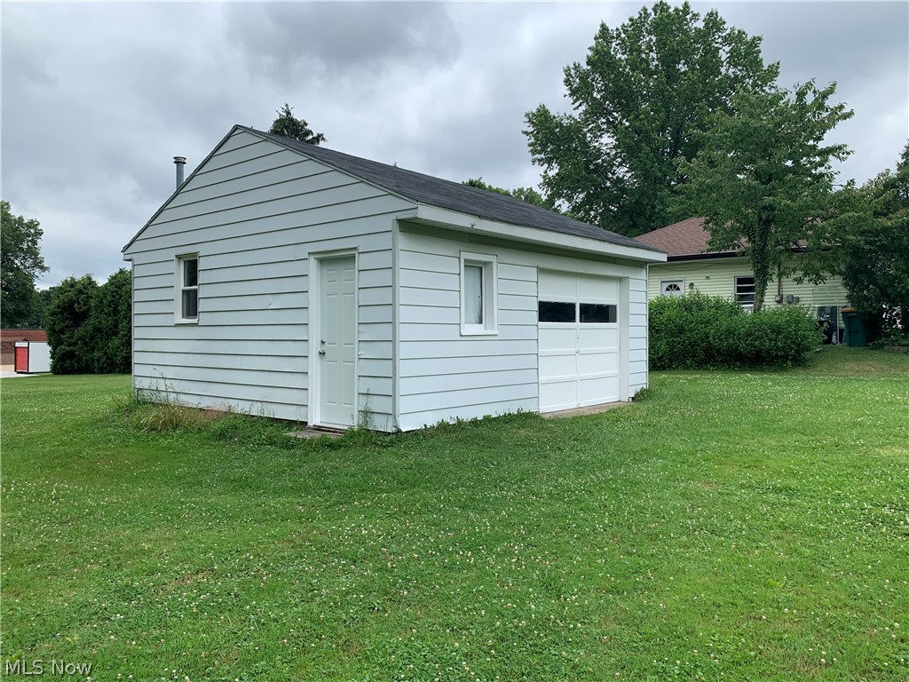 7595 Hopkins Road Mentor, OH 44060 - Photo 25 of 30 Huge heated office with new vinyl flooring and paint. Half is storage with overhead door for great storage
