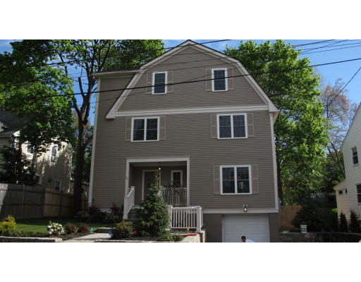 16 Marshfield Road Newton, MA 02459 - Photo 1 of 1 a front view of a house with a yard