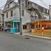 a view of a street with stores