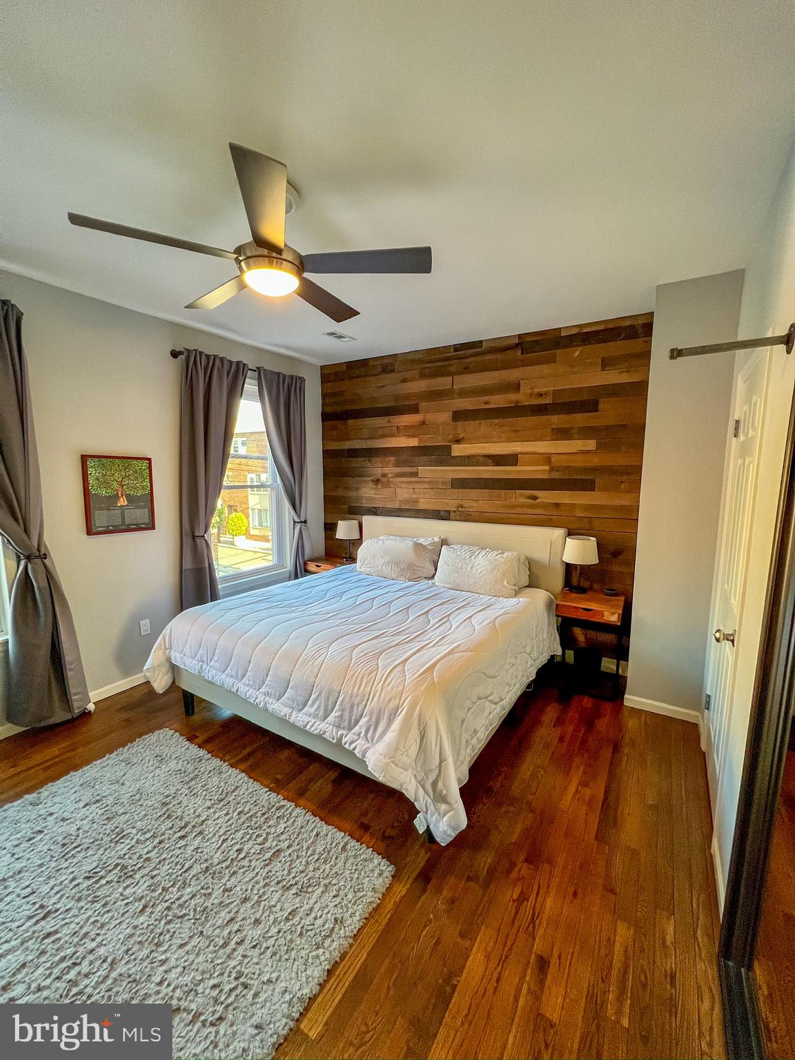 604 South 12th Street Philadelphia, PA 19147 - Photo 7 of 14 a bedroom with a bed and a walk in closet