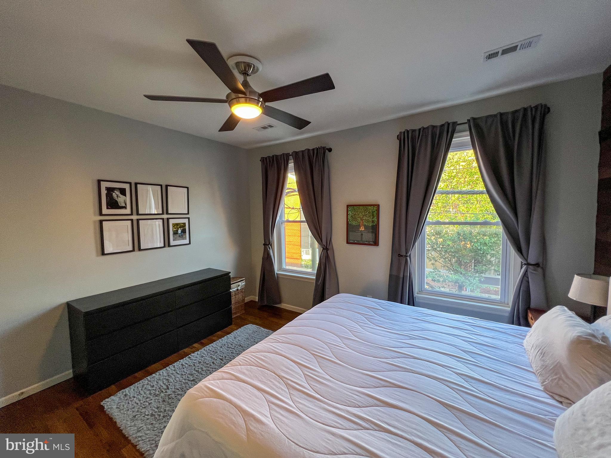 604 South 12th Street Philadelphia, PA 19147 - Photo 9 of 14 a bedroom with a bed and a large window