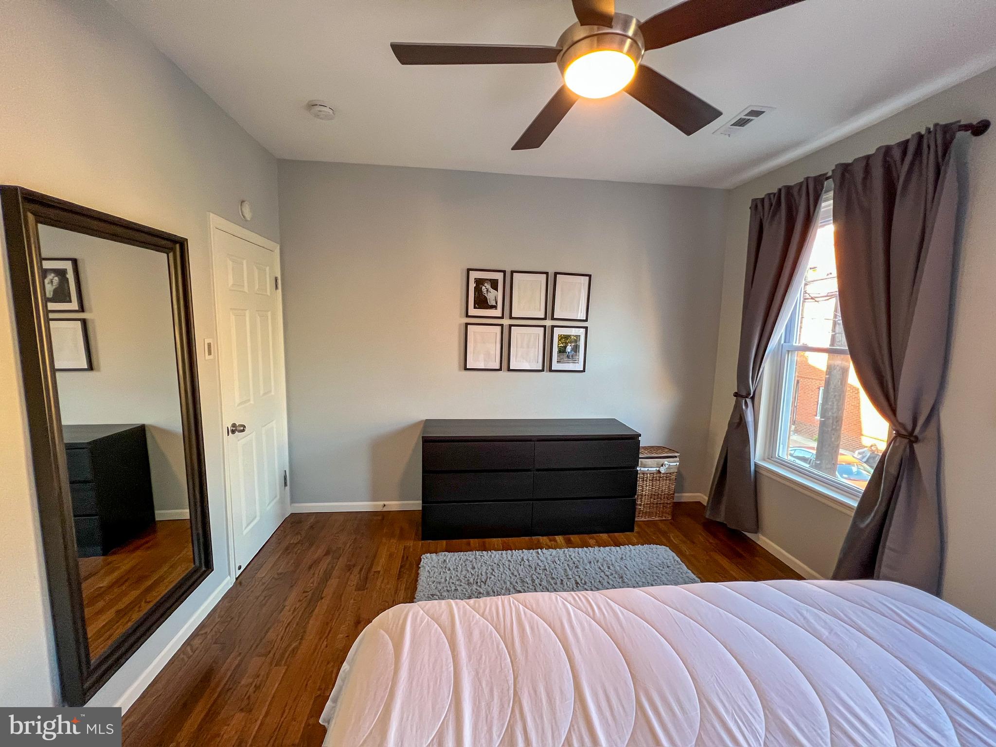 604 South 12th Street Philadelphia, PA 19147 - Photo 10 of 14 a bedroom with a bed and a window