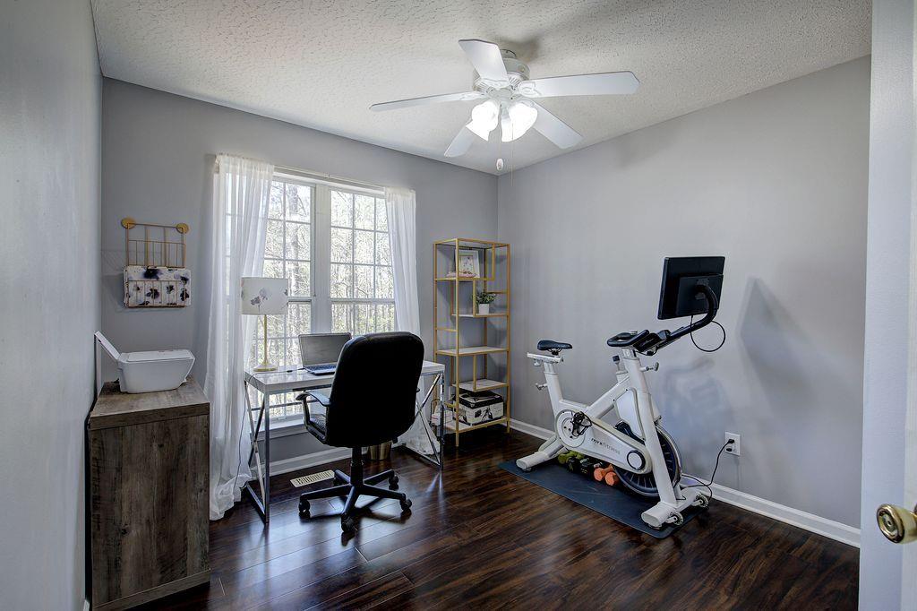 205 Cryder Lane Canton, GA 30115 - Photo 23 of 38 a view of a workspace with furniture and a window