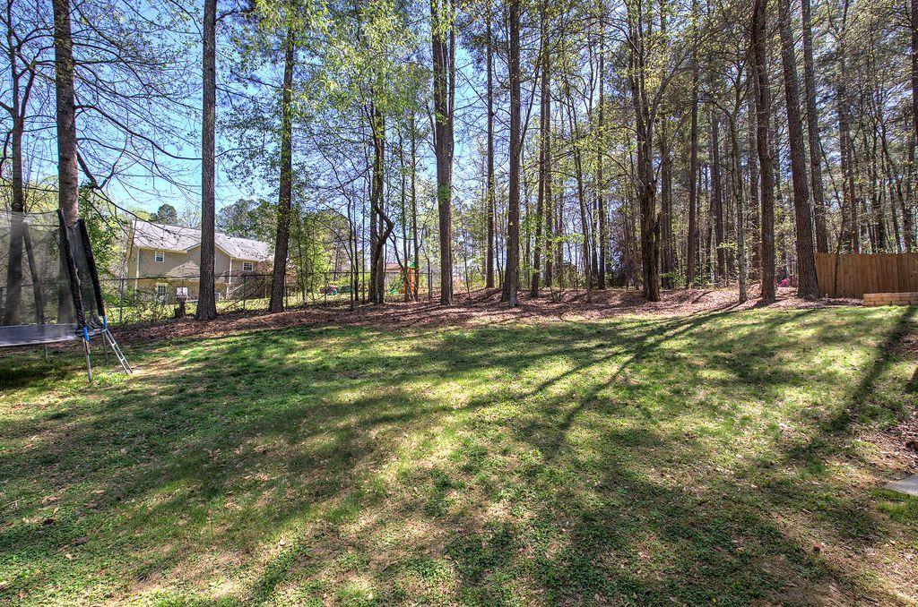 205 Cryder Lane Canton, GA 30115 - Photo 38 of 38 a big yard with trees