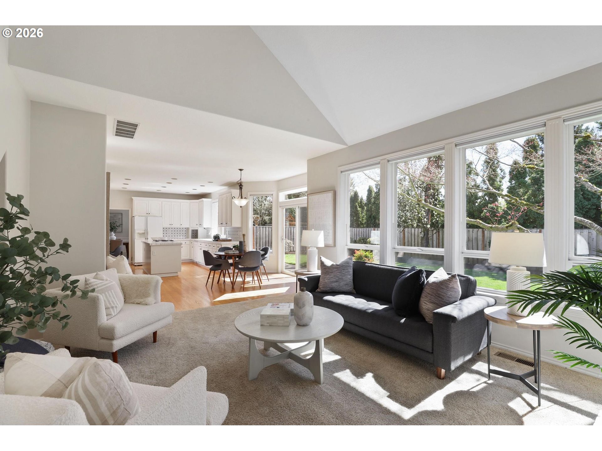 17650 Northwest Gilbert Lane Portland, OR 97229 - Photo 12 of 26 a living room with furniture and a large window