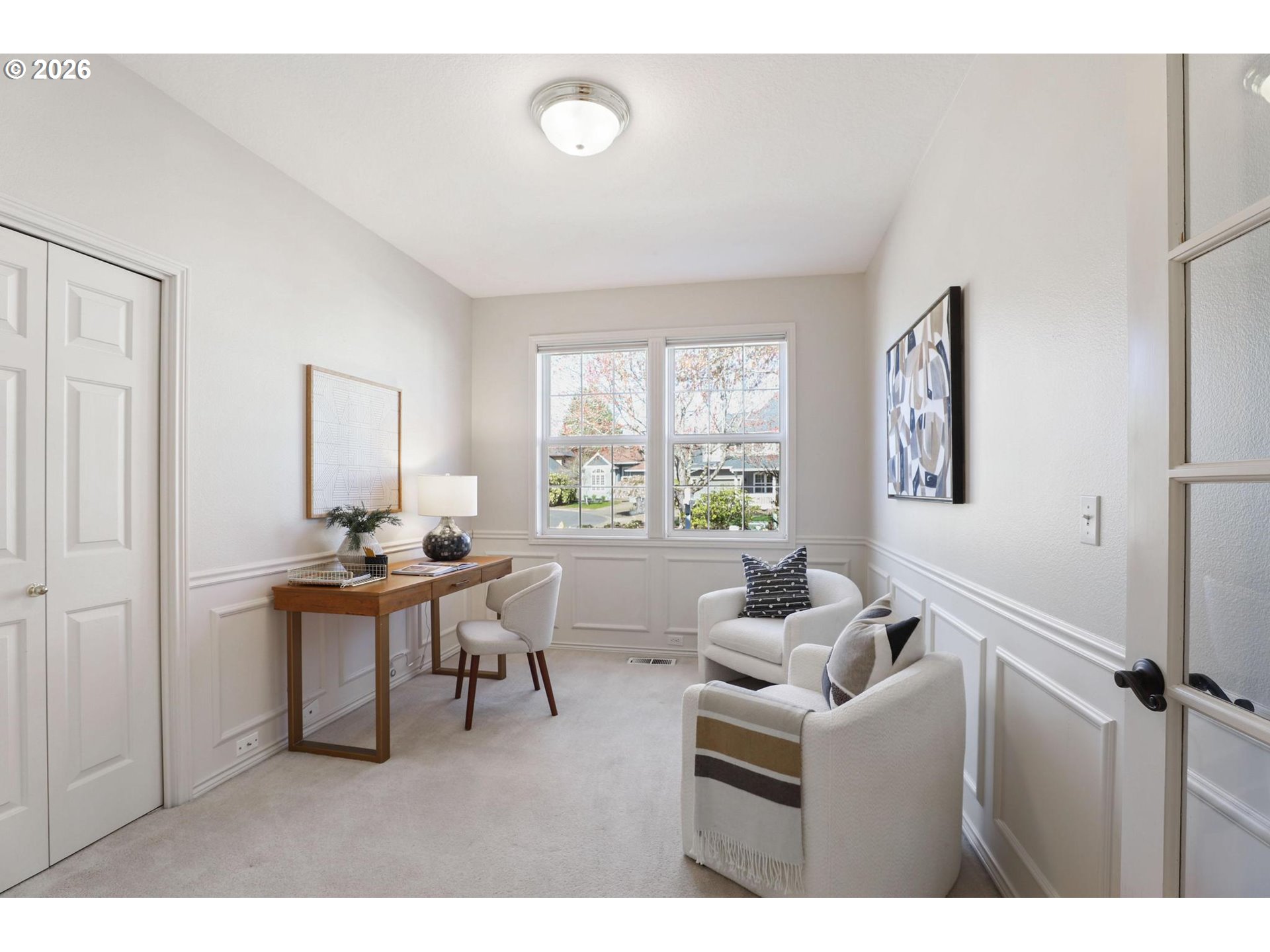 17650 Northwest Gilbert Lane Portland, OR 97229 - Photo 13 of 26 a living room with furniture a dining table and a large window