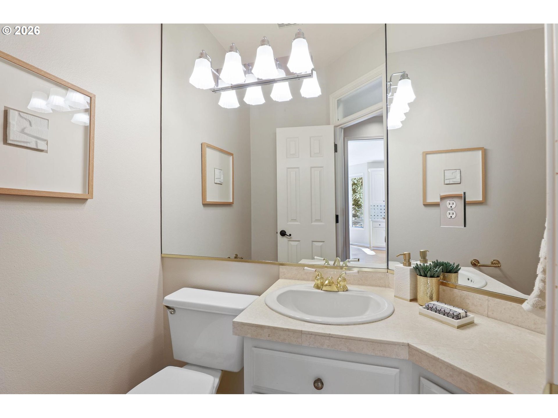 17650 Northwest Gilbert Lane Portland, OR 97229 - Photo 14 of 26 a bathroom with a sink mirror and vanity
