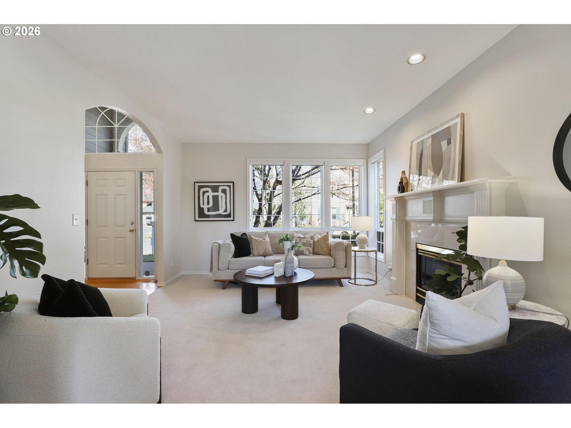 17650 Northwest Gilbert Lane Portland, OR 97229 - Photo 2 of 26 a living room with furniture and a large window
