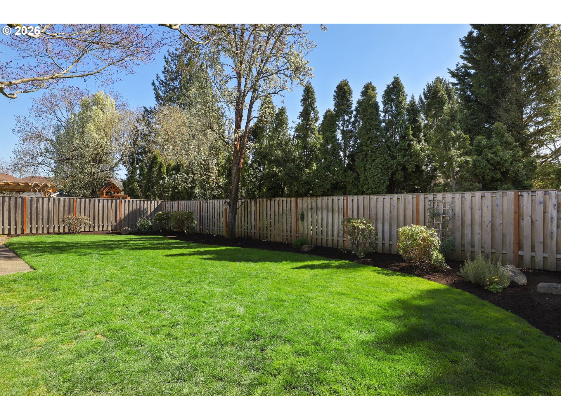 17650 Northwest Gilbert Lane Portland, OR 97229 - Photo 22 of 26 a view of outdoor space with deck and garden