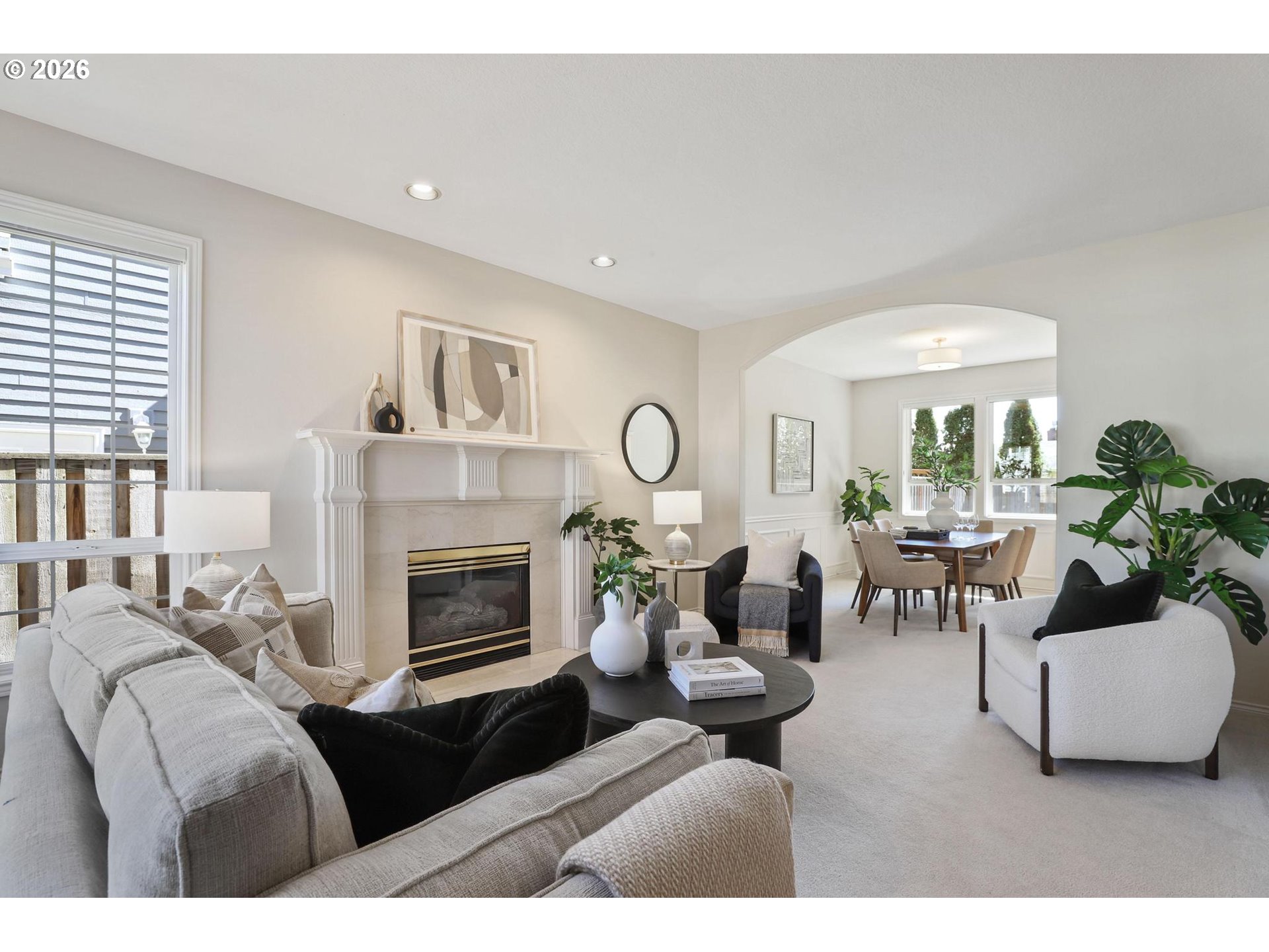 17650 Northwest Gilbert Lane Portland, OR 97229 - Photo 4 of 26 a living room with furniture and a fireplace