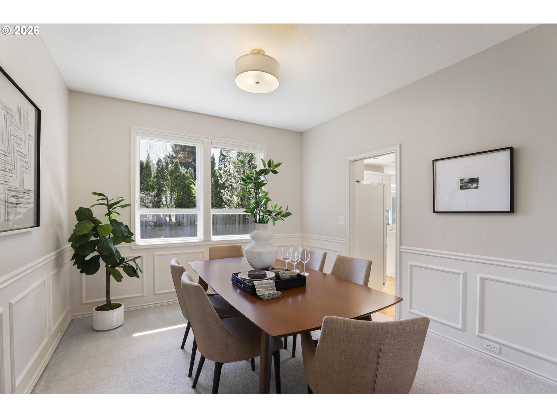17650 Northwest Gilbert Lane Portland, OR 97229 - Photo 5 of 26 a view of a dining room with furniture window and outside view