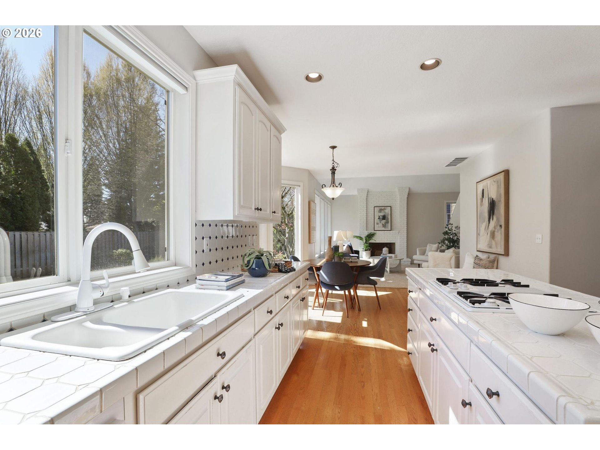 17650 Northwest Gilbert Lane Portland, OR 97229 - Photo 8 of 26 a very nice looking kitchen with a large window
