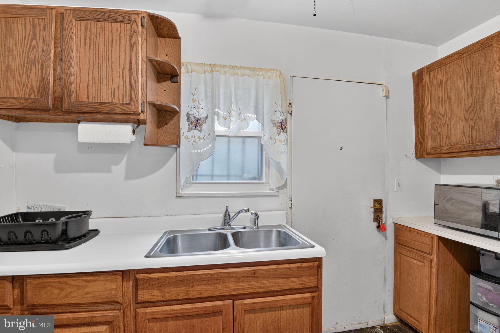 2015 Ray Leonard Road Landover, MD 20785 - Photo 5 of 15 Cozy kitchen with warm wood accents.