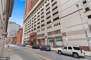 414 Water Street, Unit 1608 Baltimore, MD 21202 - Photo 3 of 26 a car parked in front of building