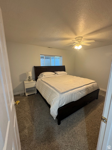 1976 River Bottom Road Springville, UT 84663 - Photo 39 of 45 Carpeted room with a ceiling fan light fixture and a window with blinds
