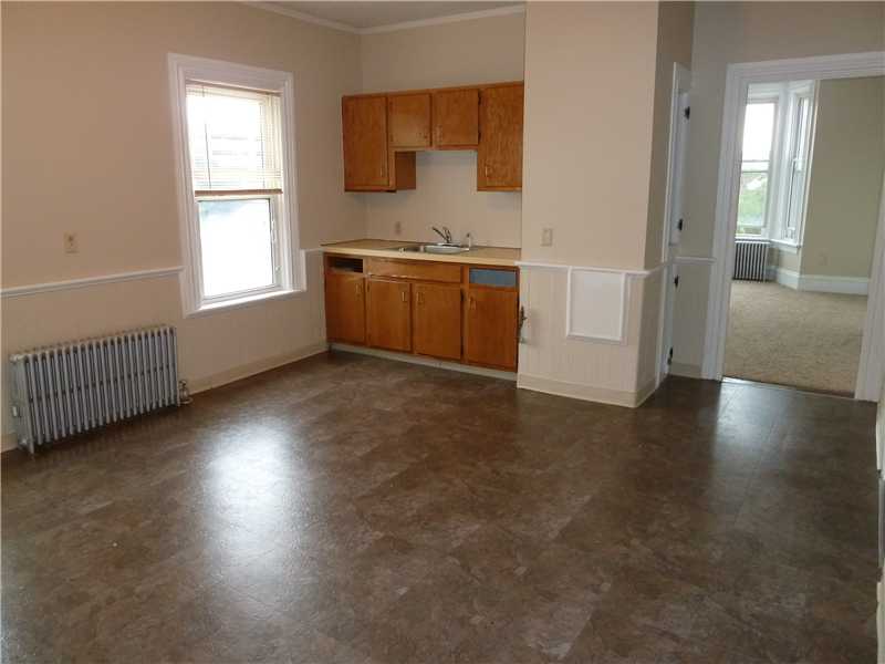 27 Kilvert Street Warwick, RI 02886 - Photo 12 of 18 Kitchen. This too is the second floor kitchen. No appliances in place. Gas is in all units.