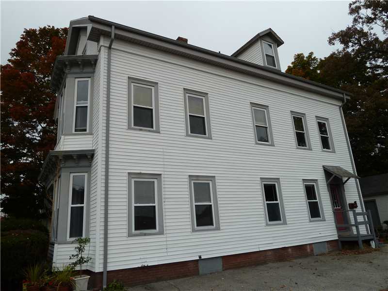 27 Kilvert Street Warwick, RI 02886 - Photo 3 of 18 Exterior Back. Large building with seperate entrances.