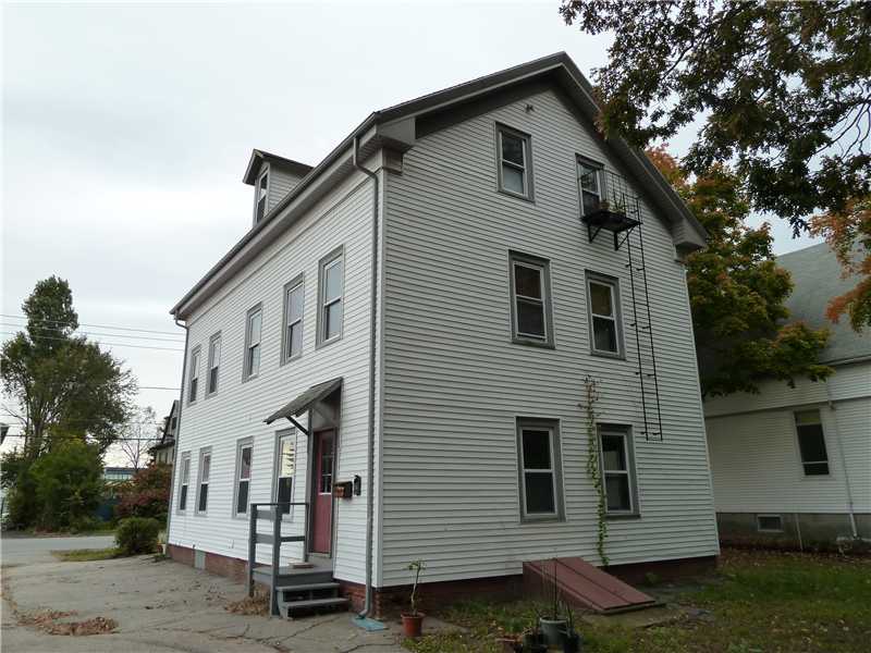 27 Kilvert Street Warwick, RI 02886 - Photo 4 of 18 Exterior Back. Plenty of parking for all units.