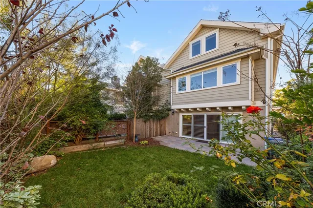 a house view with a garden space