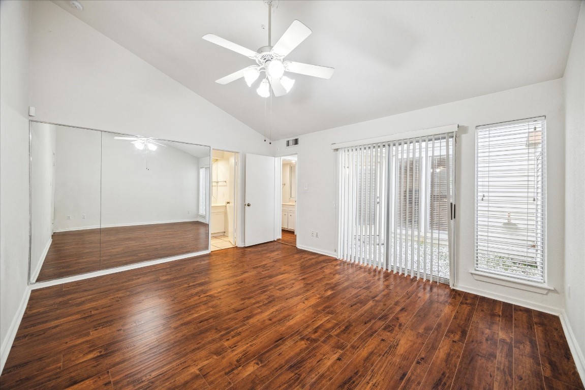 1864 South Gessner Road Houston, TX 77063 - Photo 11 of 17 a view of empty room with wooden floor and fan