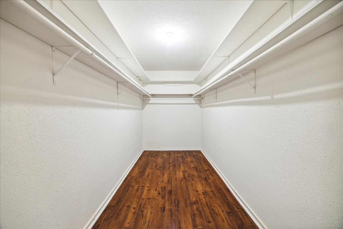 1864 South Gessner Road Houston, TX 77063 - Photo 13 of 17 a view of a room with wooden floor