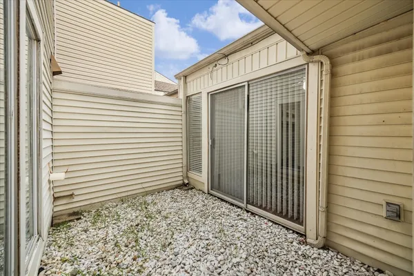 a view of a porch with a door