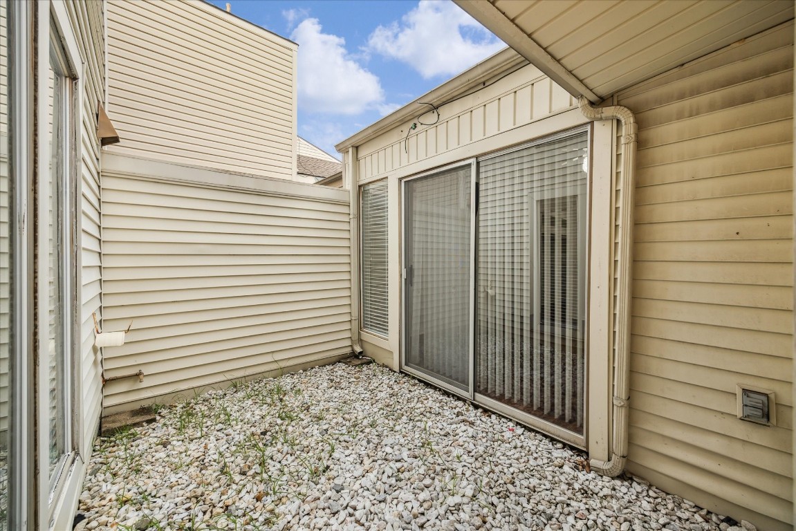 1864 South Gessner Road Houston, TX 77063 - Photo 17 of 17 a view of a porch with a door