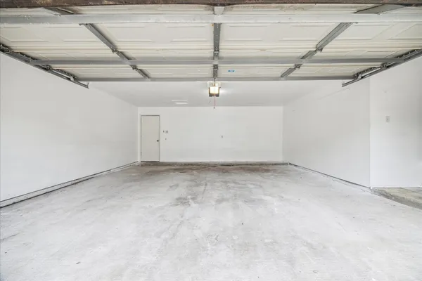 a view of a room with an empty space