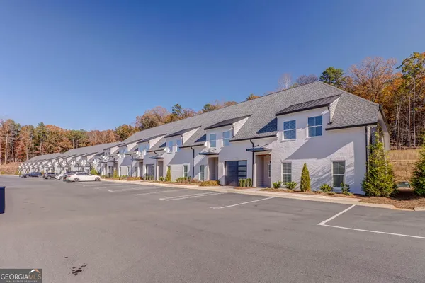 a kitchen with a stove and a microwave