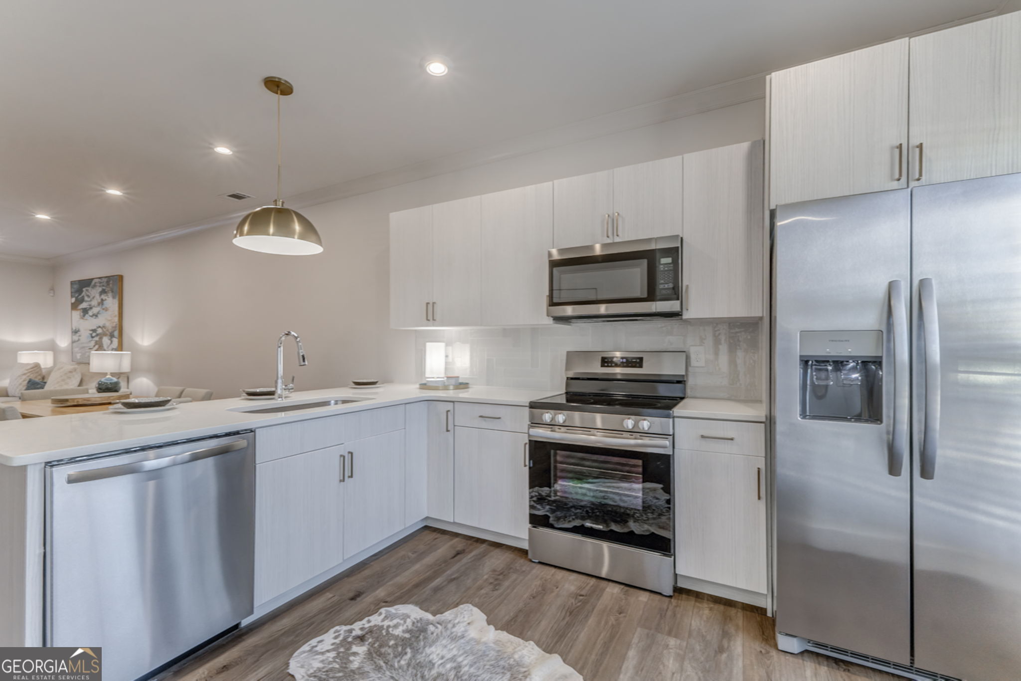 93 Chateau Drive Southeast Rome, GA 30161 - Photo 25 of 66 a kitchen with a sink stainless steel appliances and cabinets