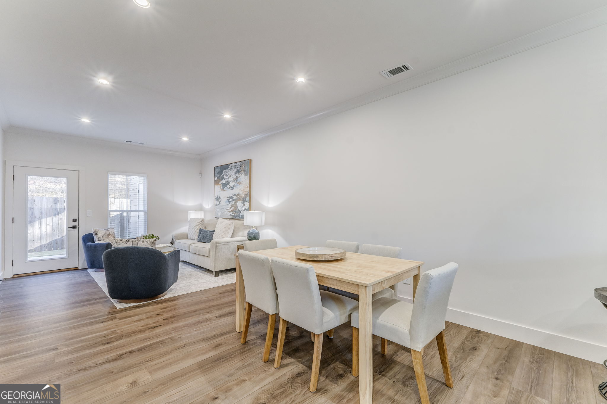 93 Chateau Drive Southeast Rome, GA 30161 - Photo 31 of 66 a view of a dining room with furniture and wooden floor