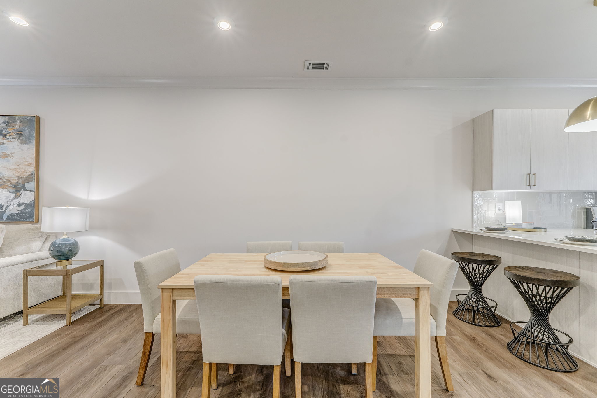 93 Chateau Drive Southeast Rome, GA 30161 - Photo 32 of 66 a view of a dining room with furniture and wooden floor