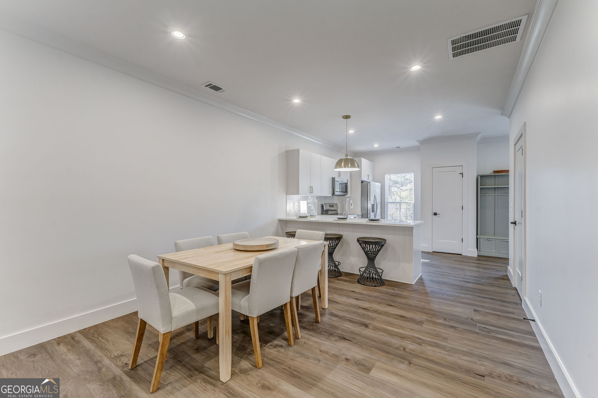 93 Chateau Drive Southeast Rome, GA 30161 - Photo 33 of 66 a view of a dining room with furniture and wooden floor
