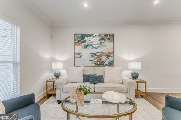 a view of a livingroom with wooden floor