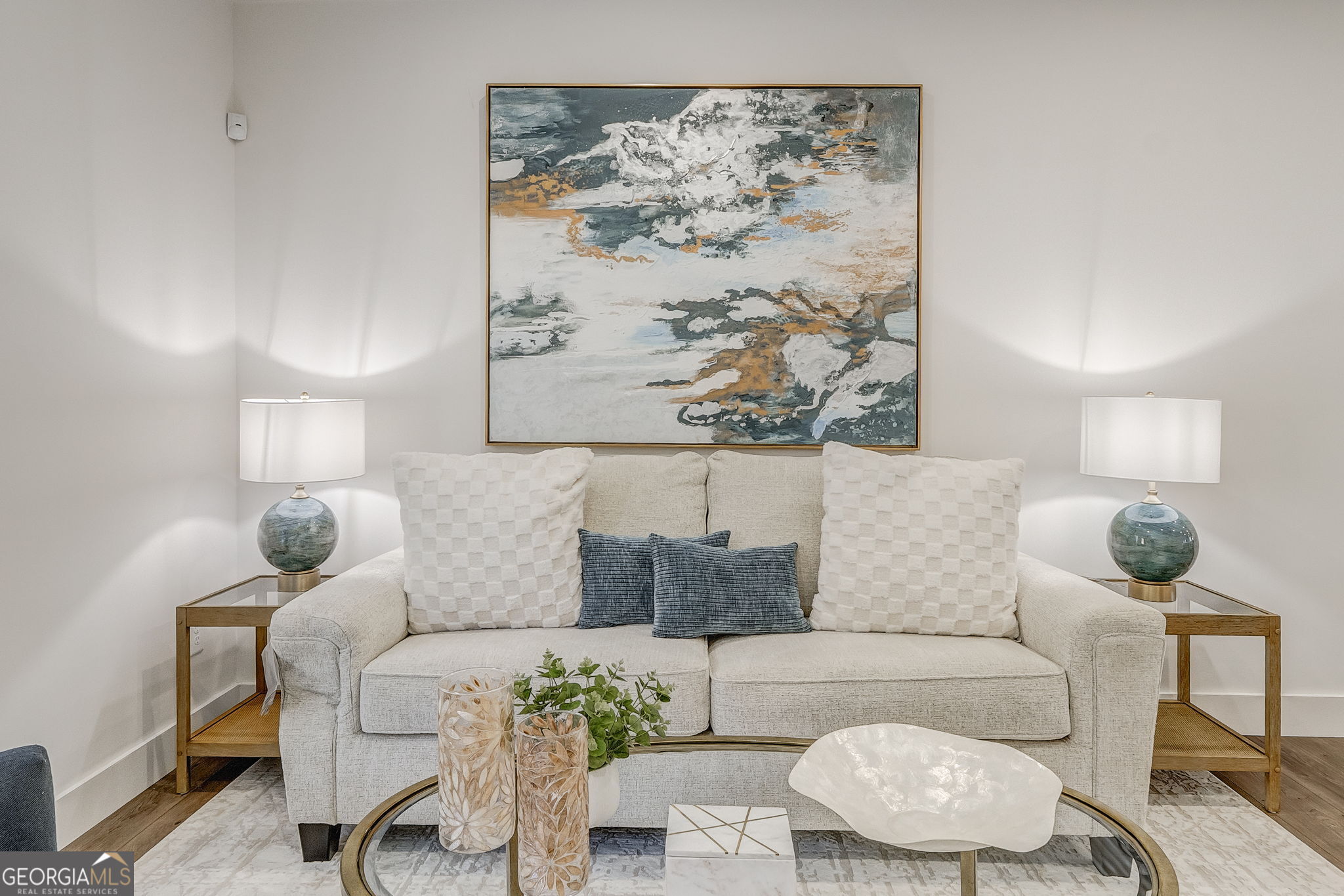 93 Chateau Drive Southeast Rome, GA 30161 - Photo 38 of 66 a living room with furniture and a painting on the wall