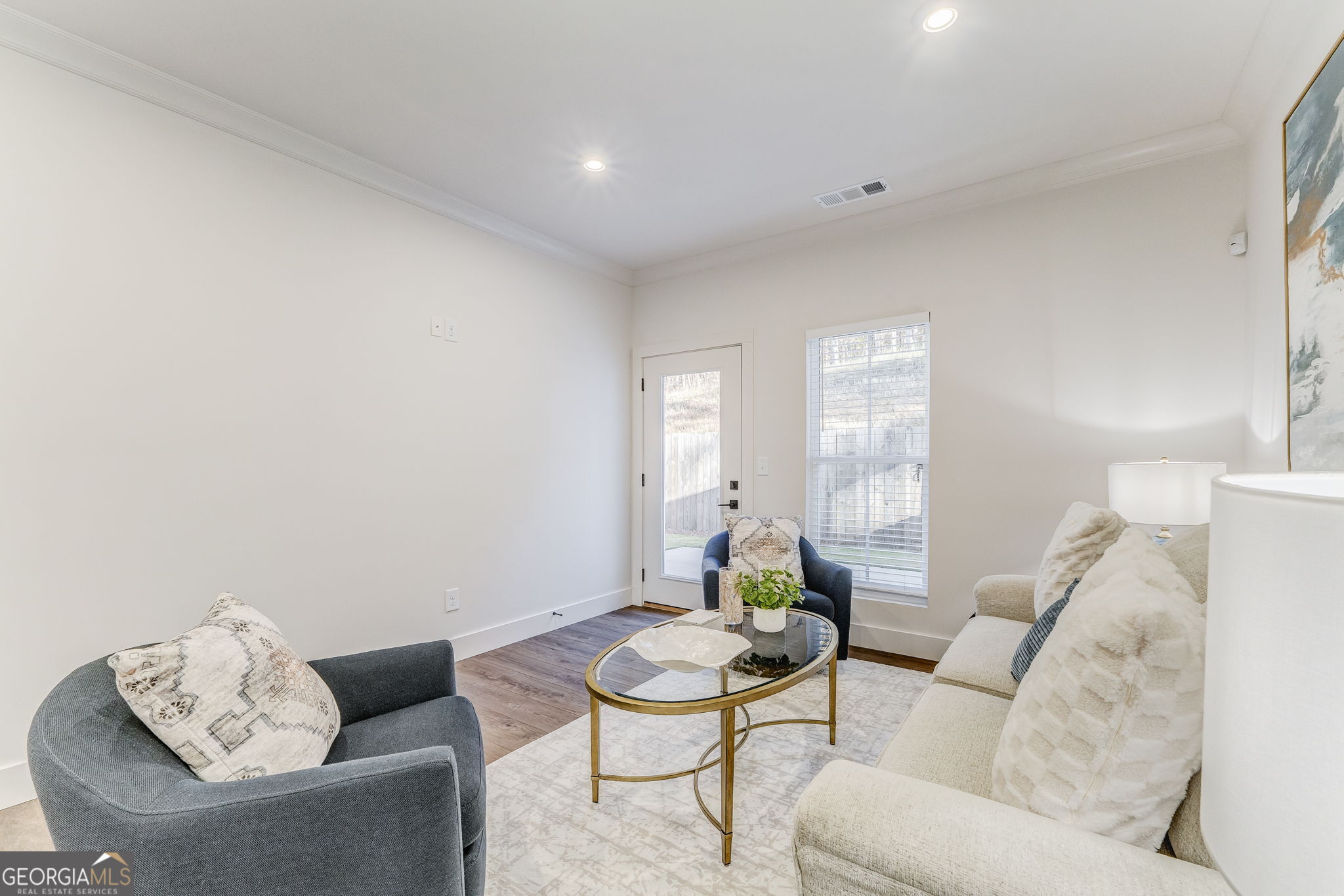 93 Chateau Drive Southeast Rome, GA 30161 - Photo 40 of 66 a living room with furniture and a window