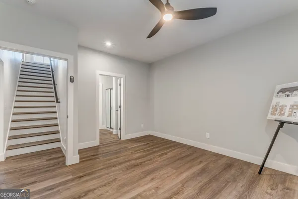 a bedroom with a bed and a table in it