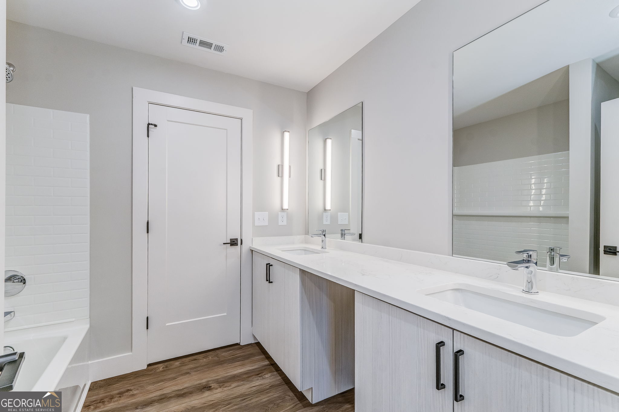 93 Chateau Drive Southeast Rome, GA 30161 - Photo 54 of 66 a bathroom with a sink and a mirror