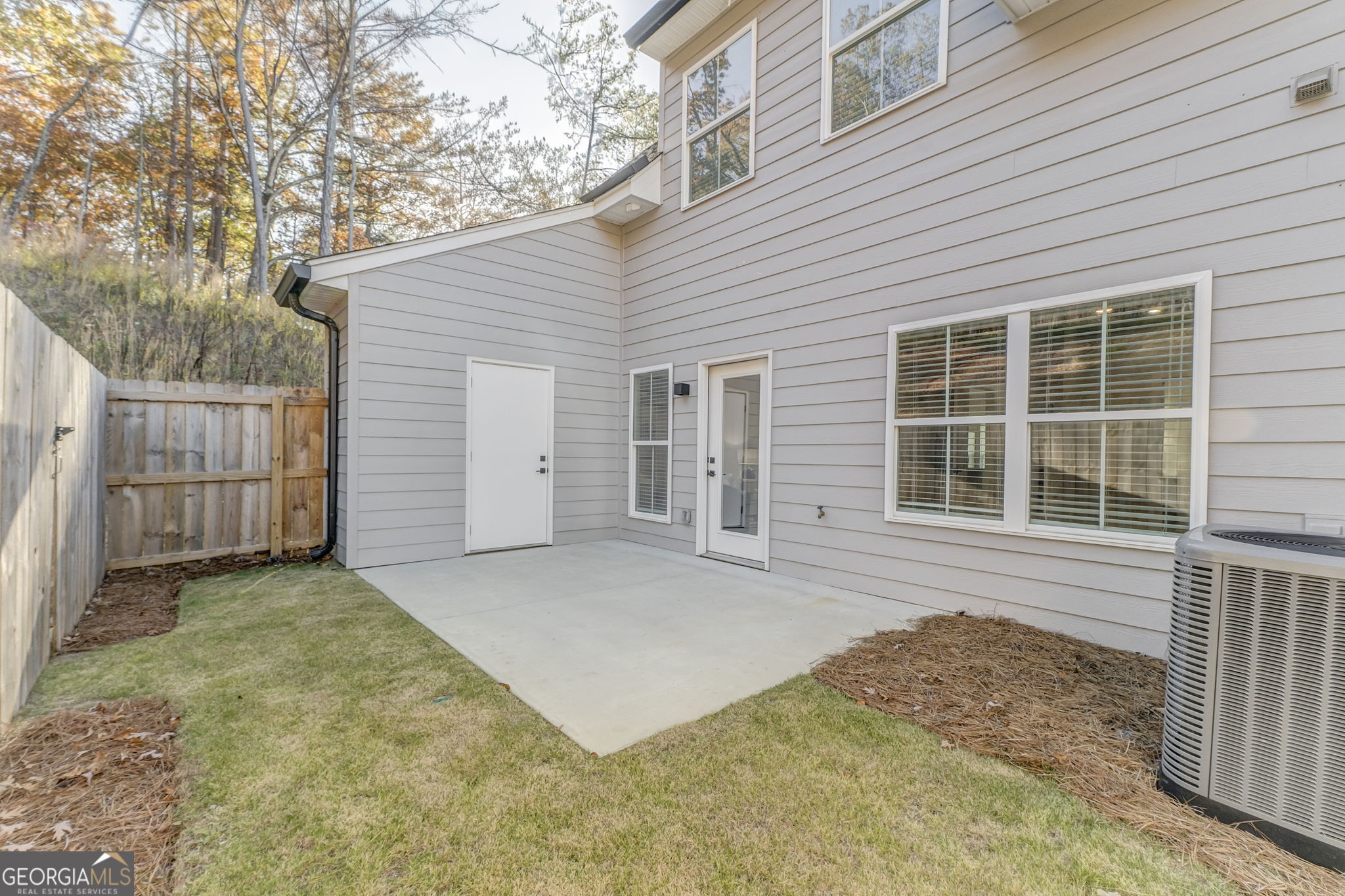 93 Chateau Drive Southeast Rome, GA 30161 - Photo 65 of 66 a front view of a house with a garage