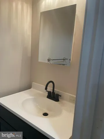 a close view of a sink and a vanity