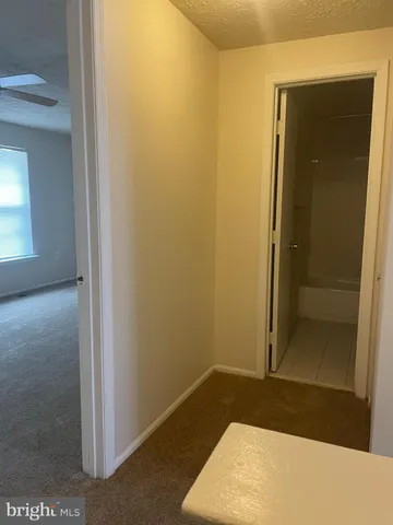 a view of a room with rack on the wall