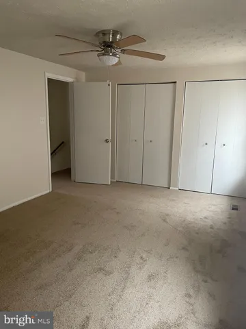 a bathroom with a toilet a sink and shower