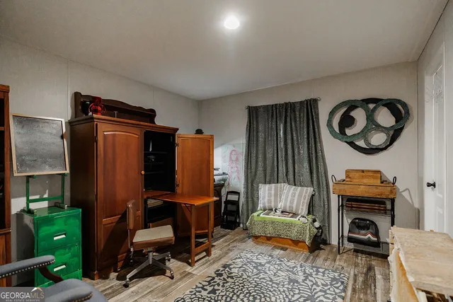 a room with furniture and a mirror