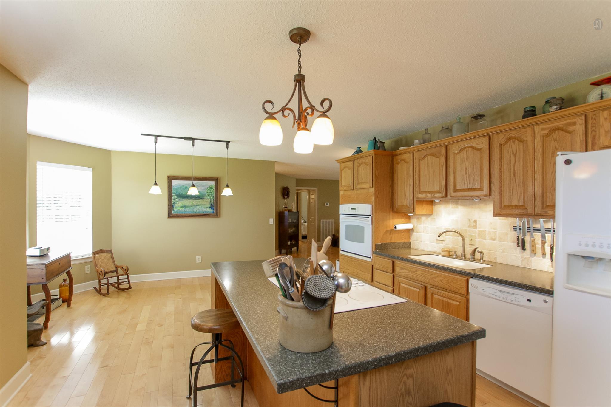 337 Tomlinson Road Lebanon, TN 37087 - Photo 15 of 27 a view of a dining room and kitchen with a table chairs