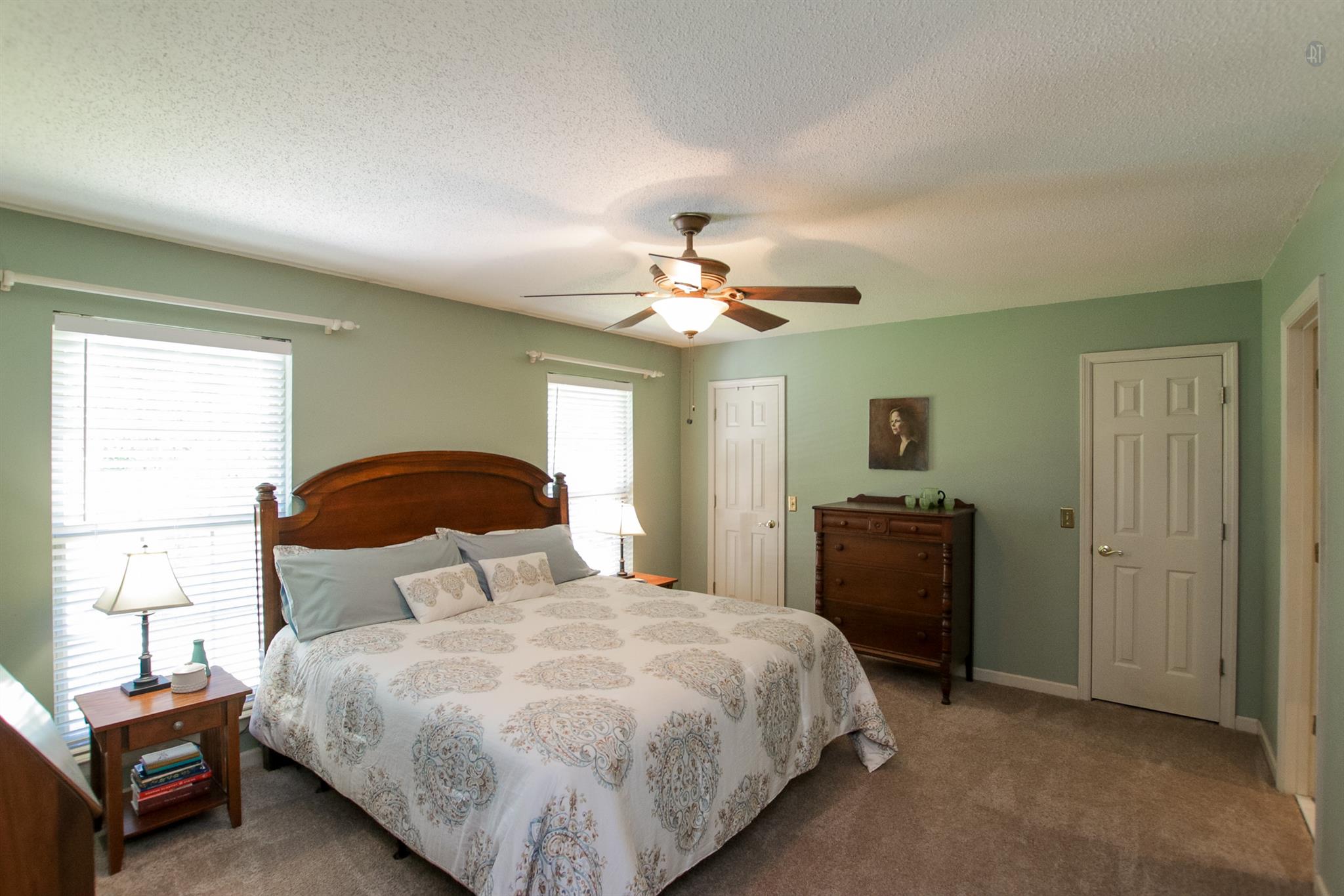 337 Tomlinson Road Lebanon, TN 37087 - Photo 16 of 27 a bedroom with a bed and a chandelier