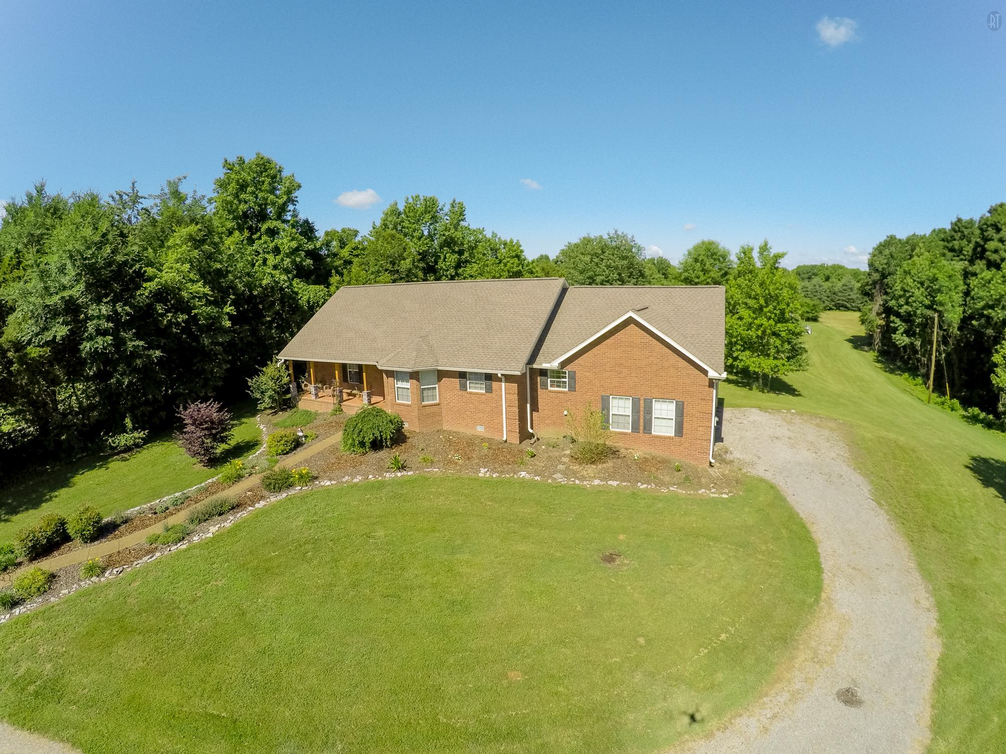 337 Tomlinson Road Lebanon, TN 37087 - Photo 27 of 27 a front view of a house with a yard