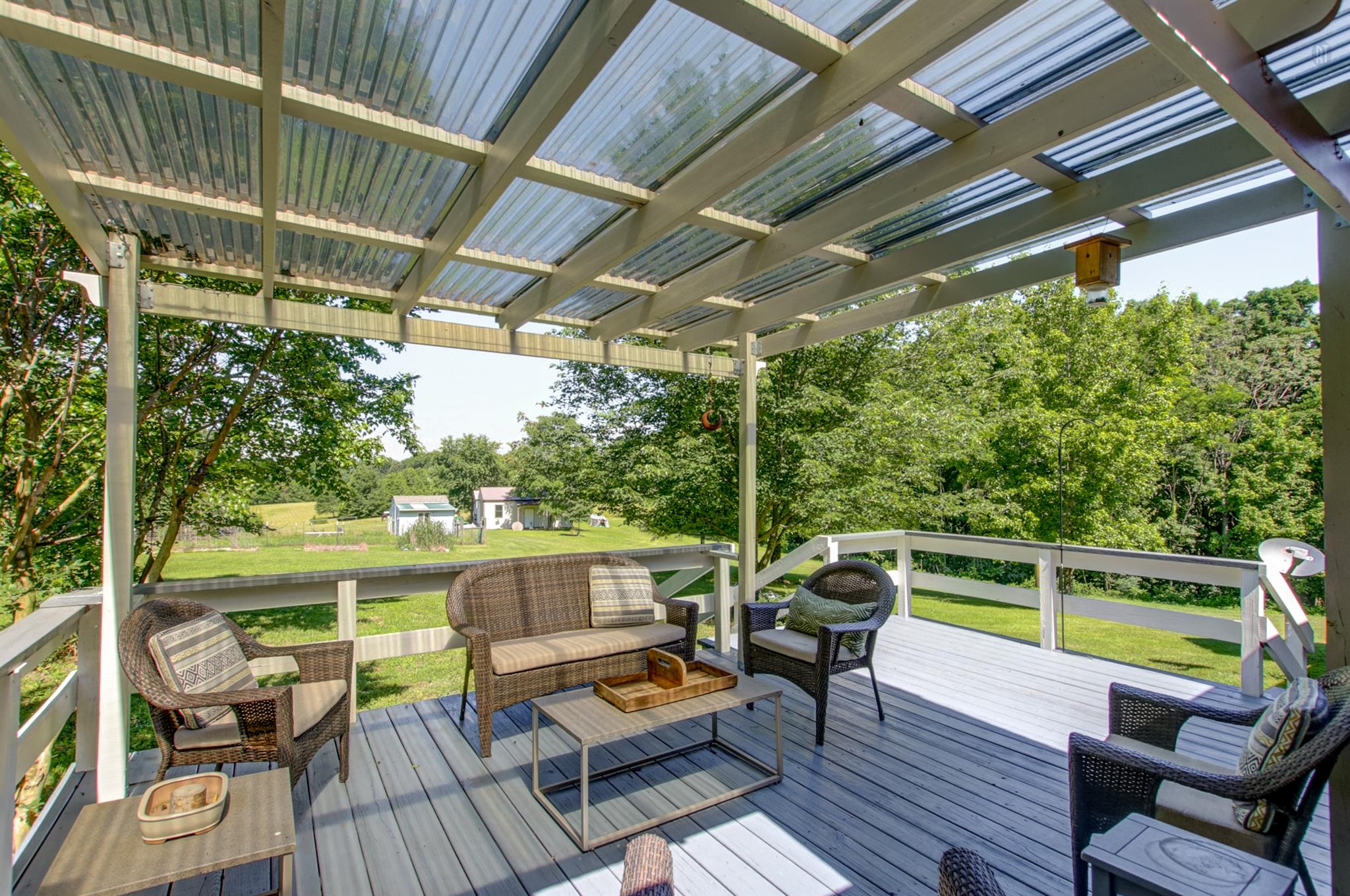 337 Tomlinson Road Lebanon, TN 37087 - Photo 4 of 27 a view of a chairs and table in the balcony
