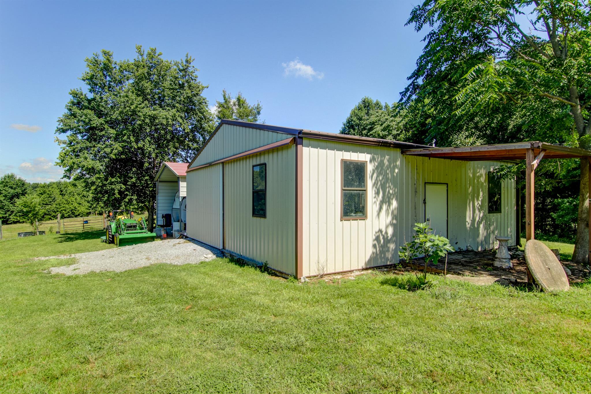 337 Tomlinson Road Lebanon, TN 37087 - Photo 8 of 27 a view of a house with backyard and garden