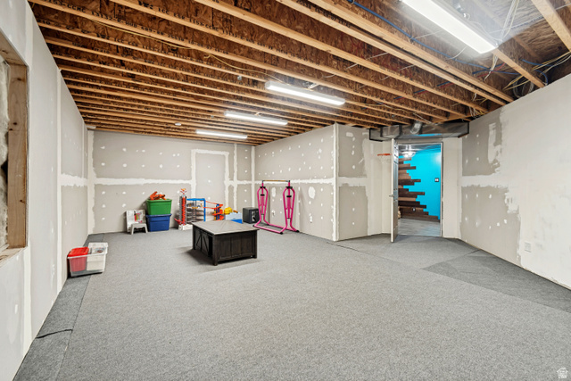 7296 Ridge Road Lake Point, UT 84074 - Photo 43 of 54 Spacious unfinished basement offering opportunity for customization